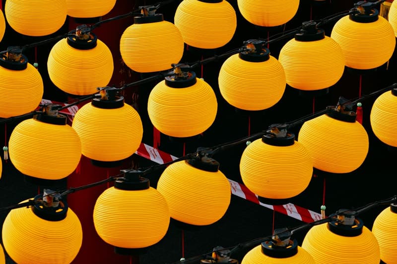Rows of golden Chinese New Year lanterns at a Kuala Lumpur temple